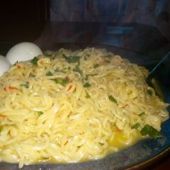 A picture of Indomie and boiled egg 1.