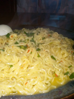 A picture of Indomie and boiled egg 1.