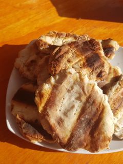 Una foto de Churrascas a la parrilla