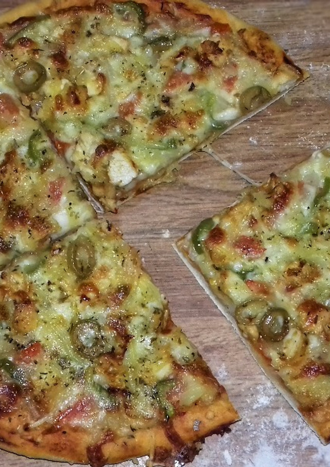 Una foto de Pizza casera con pollo🍕