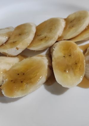Una foto de Plátano fruta con sirope