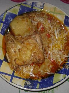 Una foto de Guiso de arroz con pollo