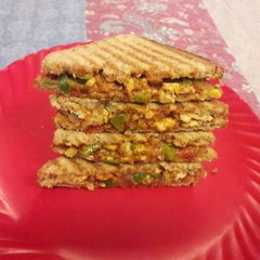 A picture of Corn.Capsicum.Cottage Cheese.Hung curd Sandwitch.