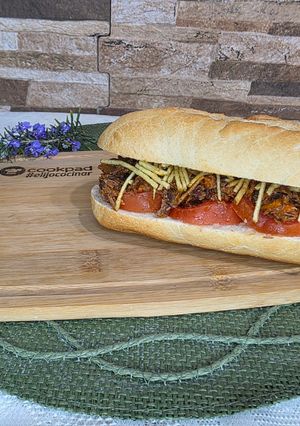 Una foto de Sándwich de entrecotte braseado