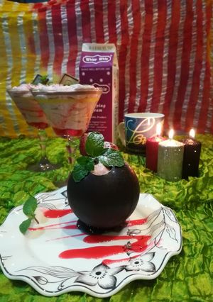 A picture of Strawberry Mousse In Chocolate Ball.