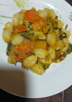 Una foto de Ñoquis con Salteado de Verduras en Reducción de Vino Tinto