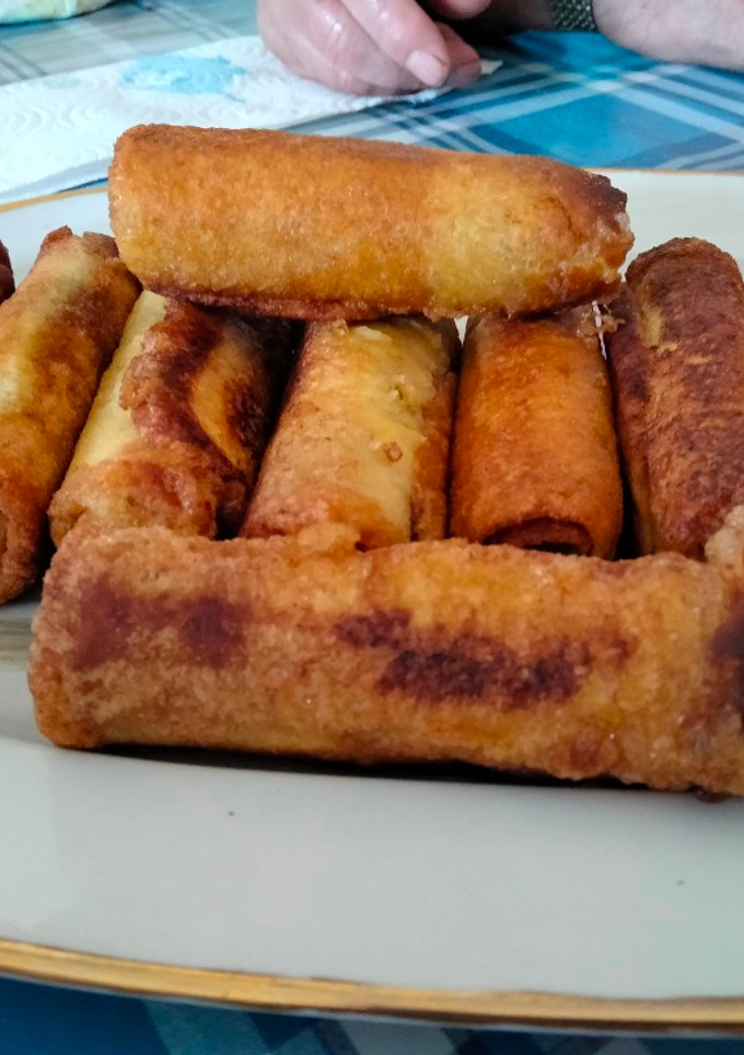 Una foto de Fritos de brioche relleno de chocolate