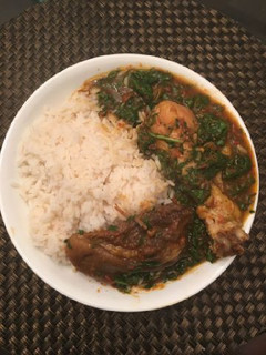 A picture of Rice with vegetable sauce.