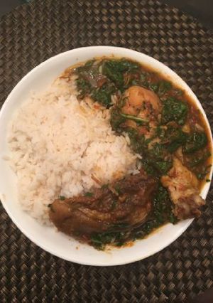 A picture of Rice with vegetable sauce.