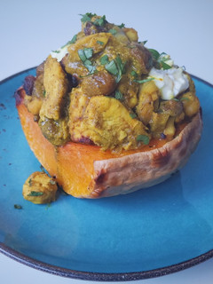 Una foto de Calabaza rellena de pollo con pasas