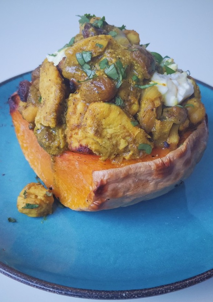 Una foto de Calabaza rellena de pollo con pasas