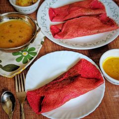 A picture of Beetroot dosa.