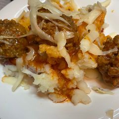 A picture of Buffalo Ranch Meatballs and blue cheese mashed potatoes.