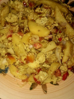 A picture of Potatoes with Scrambled eggs.