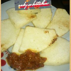 Fried yam with stew A picture of Fried yam with stew.