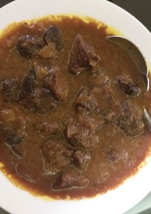 A picture of Pitted plum and beef/lamb stew.