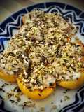 Melocotones flambeados con mascarpone a la vainilla y frutos secos