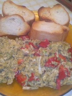 Una foto de Revuelto de ajetes tiernos y pimiento rojo