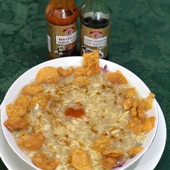 A picture of Corn Maggi Instant Noodles soup.