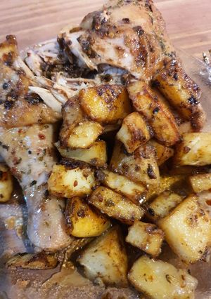 Una foto de Pollo al horno con papas