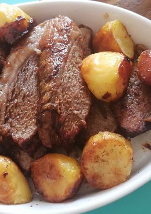 Una foto de Punta ganso al horno con Papas doradas