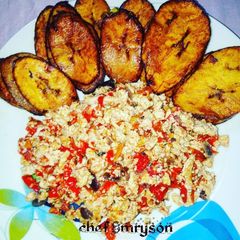 A picture of Fried egg sauce with plantain.