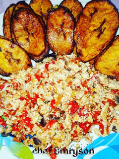 A picture of Fried egg sauce with plantain.