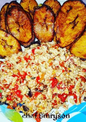 A picture of Fried egg sauce with plantain.
