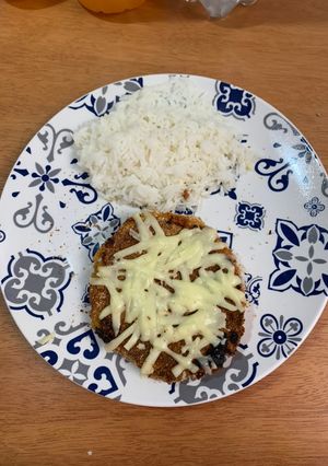 Una foto de Milanesas de calabaza con arroz