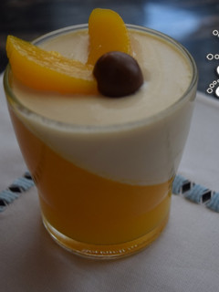 Una foto de Panna Cotta con Melocotón