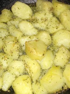 Una foto de Papas al horno