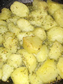 Una foto de Papas al horno