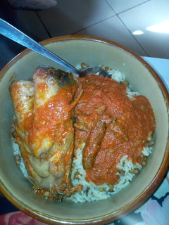 A picture of Catfish stew with rice and beans.