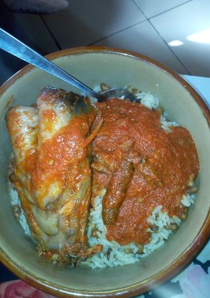 A picture of Catfish stew with rice and beans.