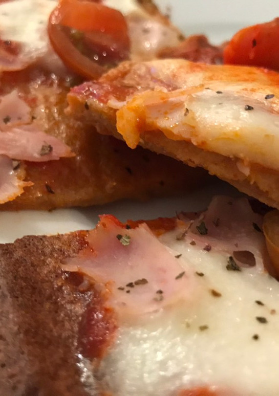 Una foto de Pizza con base de quinoa
