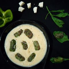 Spinach roll in cheese sauce A picture of Spinach roll in cheese sauce.