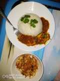 Egg curry served with white rice and sauted cabbage