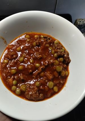 Una foto de Salsa Bolognesa y arvejas