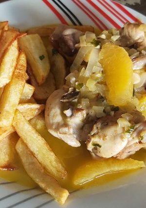 Foto principal de Conejo a la naranja con patatas fritas