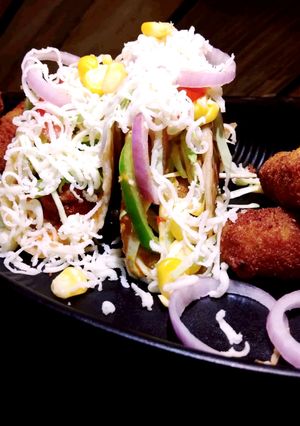 A picture of Cheese veggie wrap.