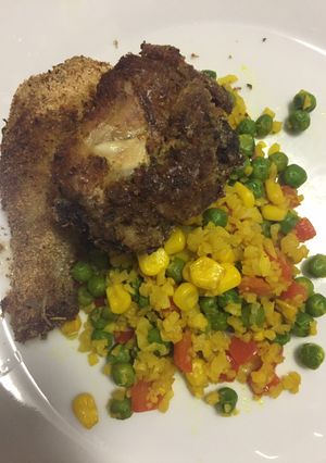 A picture of Cauliflower Rice and Roasted Chicken.