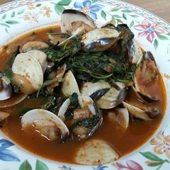 A picture of Sweet Basil with clams.
