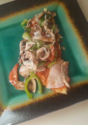 Una foto de Pizza paleo, base de coliflor