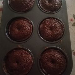 A picture of Chocolate donuts cup cakes.