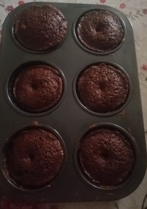 A picture of Chocolate donuts cup cakes.