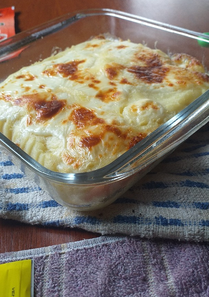 Una foto de Pastel de puré de papas con jamón y queso