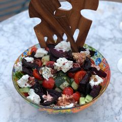 A picture of BBQ beetroot and goats cheese salad.