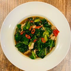 A picture of Spring green and pork stir-fry.