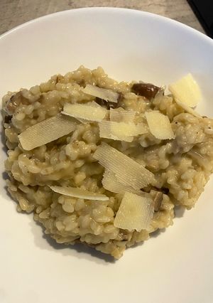 Una foto de Risotto de muchardinas y champiñones