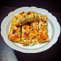 Una foto de চিকেন স্টাফ ক্যানালোনেস (Chicken Stuffed Canallones Recipe In Bengali)